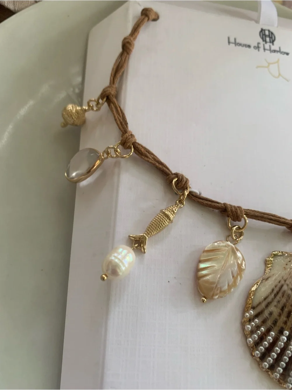 House of Harlow 1960 Brown Cord Shell & Pearl Charm Necklace with Gold Accents